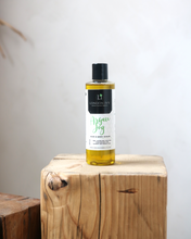 Load image into Gallery viewer, 8oz Argan Joy hair and body serum /oil sittinh on wooden slab